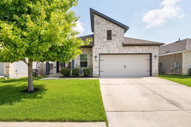 129 Lacey Oak Loop, San Marcos, TX 78666 - view of front of home with stone siding, driveway, and a front lawn