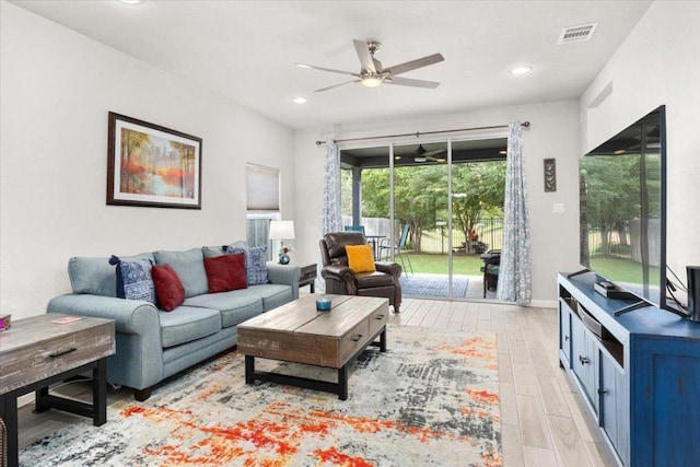 129 Lacey Oak Loop, San Marcos, TX 78666 - living room featuring a ceiling fan, light wood-style floors, and recessed lighting