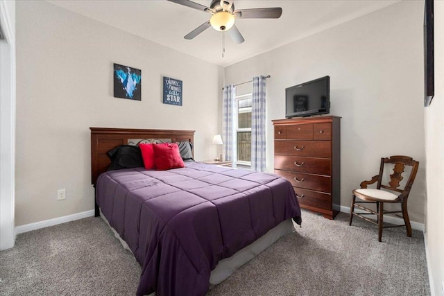129 Lacey Oak Loop, San Marcos, TX 78666 - bedroom with carpet flooring, baseboards, and a ceiling fan