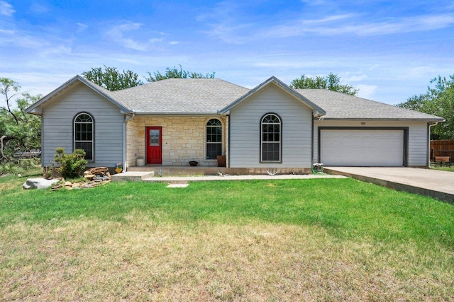 136 W Maple Dr, Granite Shoals, TX 78654 - ranch-style home with a garage, a front lawn, concrete driveway, a shingled roof, and stone siding
