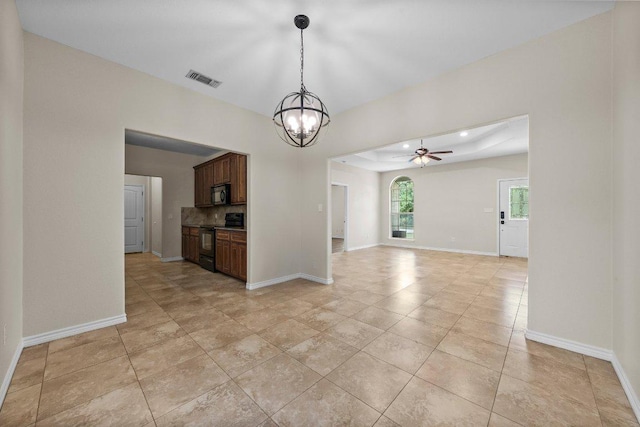 136 W Maple Dr, Granite Shoals, TX 78654 - kitchen featuring black appliances, backsplash, a chandelier, pendant lighting, and a ceiling fan