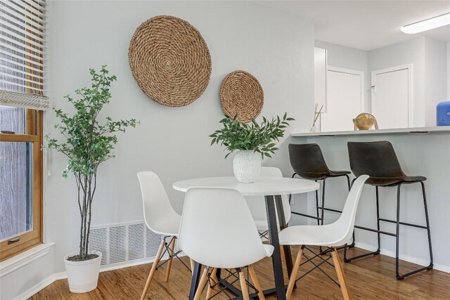 12319 Emery Oaks Rd, Austin, TX 78758 - dining room with wood finished floors and baseboards