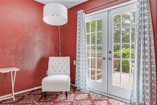 12319 Emery Oaks Rd, Austin, TX 78758 - living area featuring french doors and baseboards