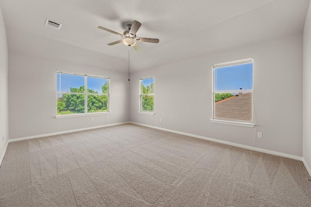 215 Gainer Dr, Hutto, TX 78634 - carpeted empty room with ceiling fan and baseboards