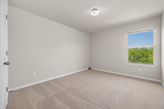 215 Gainer Dr, Hutto, TX 78634 - unfurnished room featuring carpet floors and baseboards