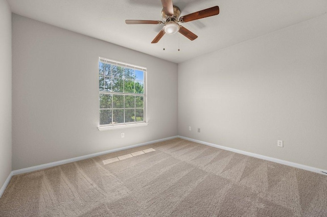 215 Gainer Dr, Hutto, TX 78634 - carpeted spare room with a ceiling fan and baseboards