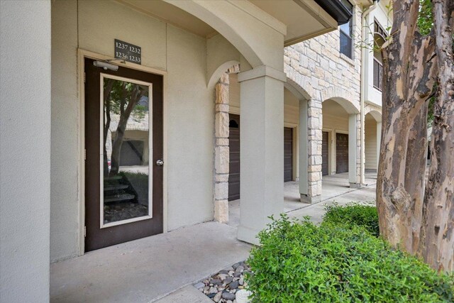7701 Rialto Blvd Unit 1232, Austin, TX 78735 - entrance to property featuring stone siding