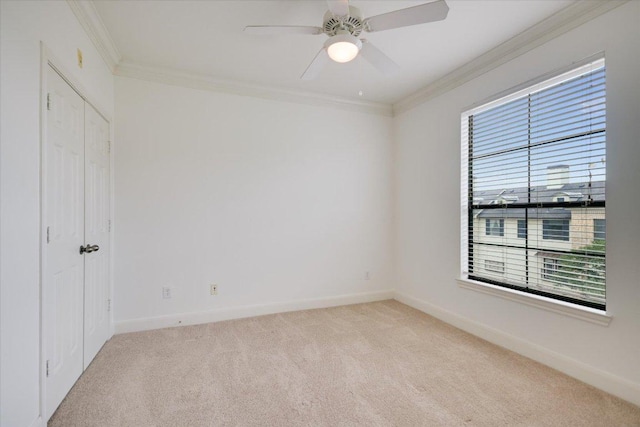 7701 Rialto Blvd Unit 1232, Austin, TX 78735 - unfurnished bedroom with crown molding, light carpet, baseboards, and a ceiling fan