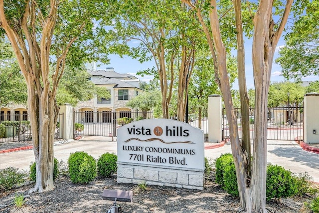 7701 Rialto Blvd Unit 1232, Austin, TX 78735 - community sign featuring a gate
