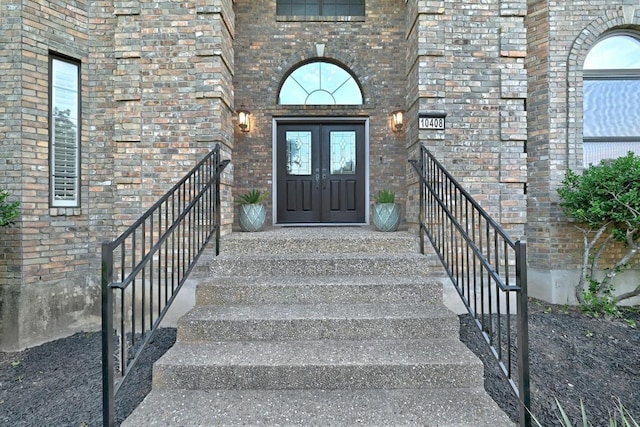 10408 Cassia Dr, Austin, TX 78759 - property entrance featuring french doors and brick siding