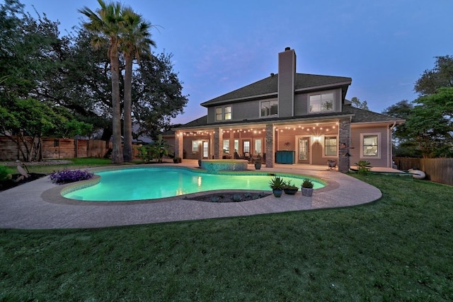 10408 Cassia Dr, Austin, TX 78759 - rear view of property featuring a chimney and a patio area
