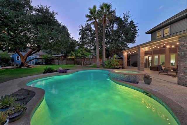 10408 Cassia Dr, Austin, TX 78759 - pool at dusk featuring a patio area and a pool with connected hot tub
