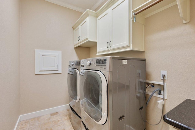 3602 Red Cedar Ct, Bryan, TX 77807 - washroom featuring washing machine and clothes dryer, cabinet space, crown molding, and baseboards