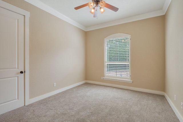 3602 Red Cedar Ct, Bryan, TX 77807 - spare room with ornamental molding, carpet floors, ceiling fan, and baseboards