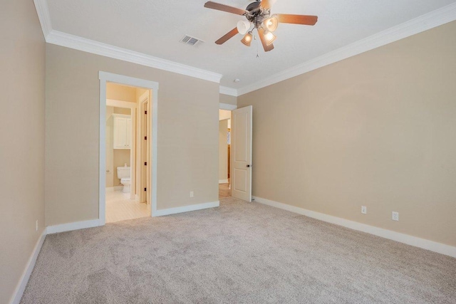 3602 Red Cedar Ct, Bryan, TX 77807 - unfurnished bedroom with crown molding, carpet floors, baseboards, ensuite bathroom, and a ceiling fan