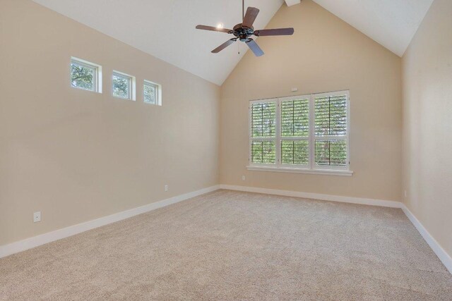 3602 Red Cedar Ct, Bryan, TX 77807 - spare room featuring high vaulted ceiling, light carpet, a ceiling fan, and baseboards