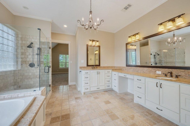 3602 Red Cedar Ct, Bryan, TX 77807 - bathroom featuring a chandelier, a stall shower, double vanity, a garden tub, and crown molding