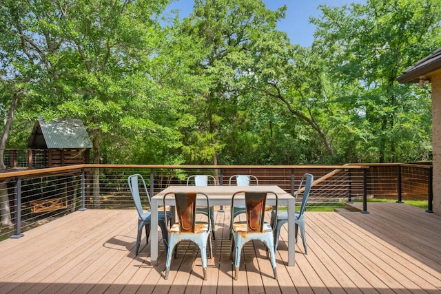 3602 Red Cedar Ct, Bryan, TX 77807 - wooden deck with outdoor dining space