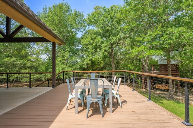 3602 Red Cedar Ct, Bryan, TX 77807 - wooden terrace featuring outdoor dining area