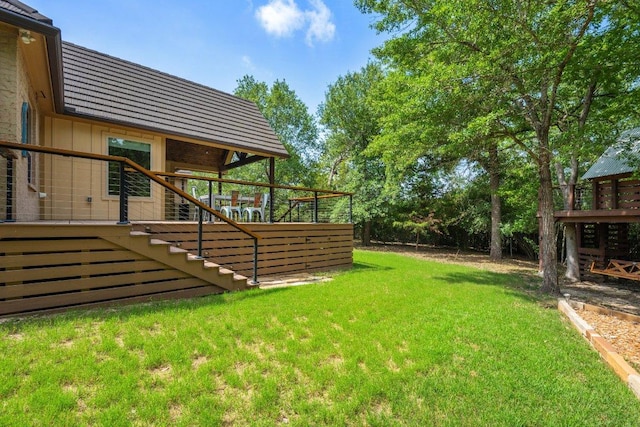 3602 Red Cedar Ct, Bryan, TX 77807 - view of green lawn with stairway and a deck
