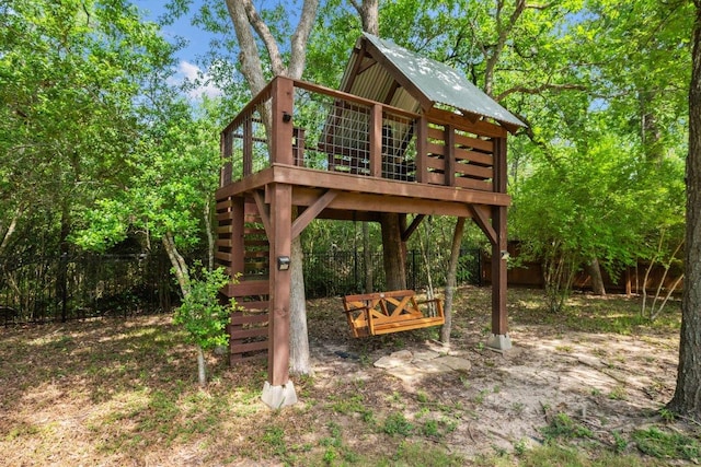 3602 Red Cedar Ct, Bryan, TX 77807 - view of play area with a deck