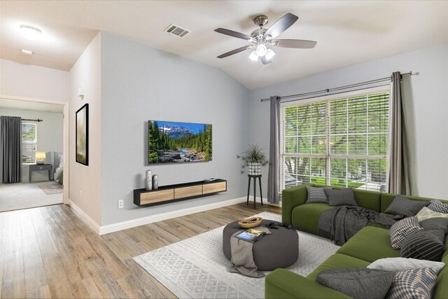 2709 Melba Pass, Cedar Park, TX 78613 - living room with wood finished floors, ceiling fan, and lofted ceiling