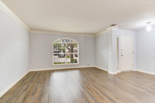 2709 Melba Pass, Cedar Park, TX 78613 - empty room with wood finished floors, crown molding, and baseboards