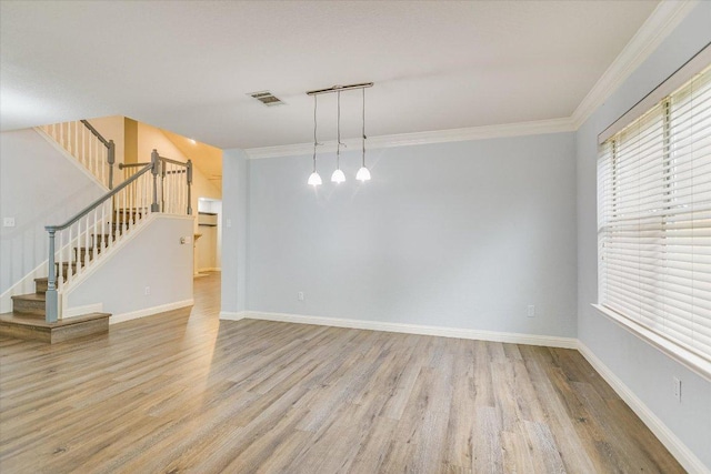 2709 Melba Pass, Cedar Park, TX 78613 - unfurnished living room featuring wood finished floors, stairs, ornamental molding, and baseboards