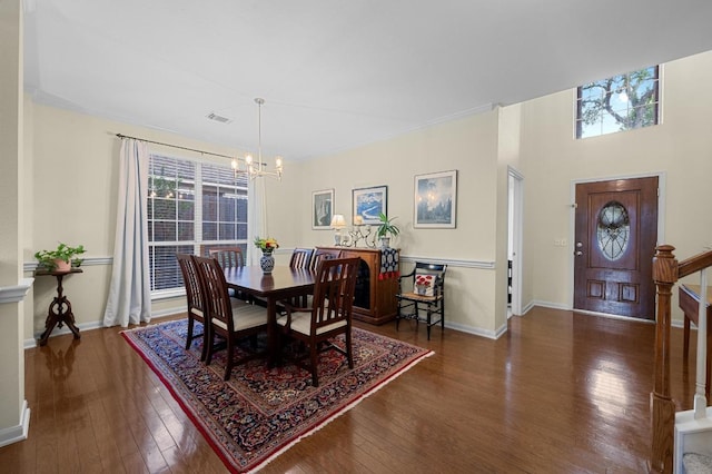 5302 Austral Loop, Austin, TX 78739 - dining area featuring a chandelier and wood-type flooring
