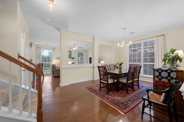 5302 Austral Loop, Austin, TX 78739 - dining area featuring a chandelier, wood-type flooring, and stairs