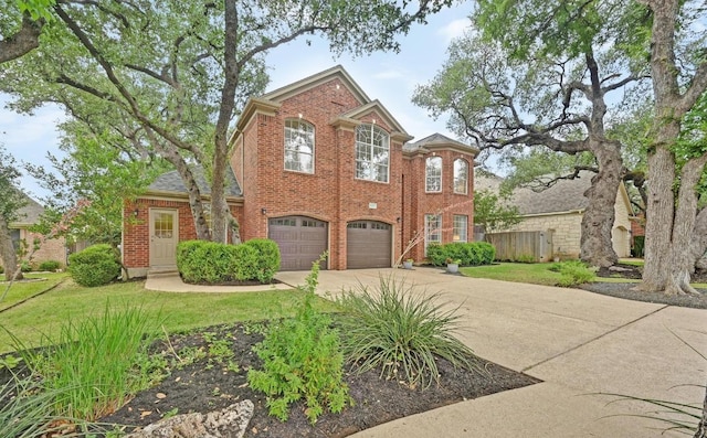 5302 Austral Loop, Austin, TX 78739 - traditional-style house with concrete driveway, brick siding, and a garage
