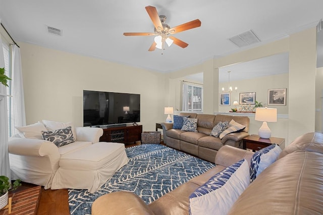 5302 Austral Loop, Austin, TX 78739 - living area featuring a chandelier, wood finished floors, and ceiling fan