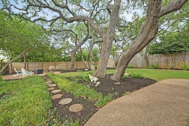 5302 Austral Loop, Austin, TX 78739 - fenced backyard with a patio area and a shed