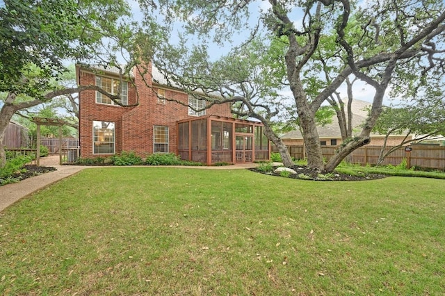 5302 Austral Loop, Austin, TX 78739 - rear view of house with a sunroom, brick siding, a fenced backyard, and a chimney