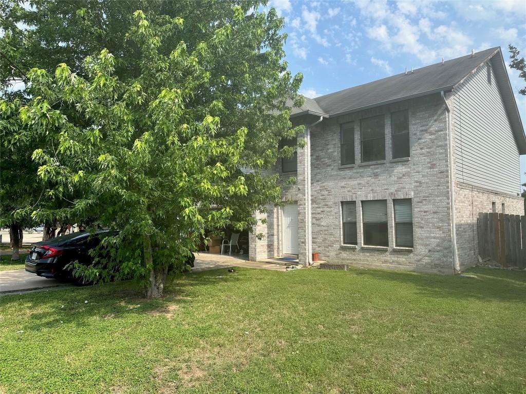 1700 Treeline Dr, Cedar Park, TX 78613 - view of home's exterior featuring brick siding