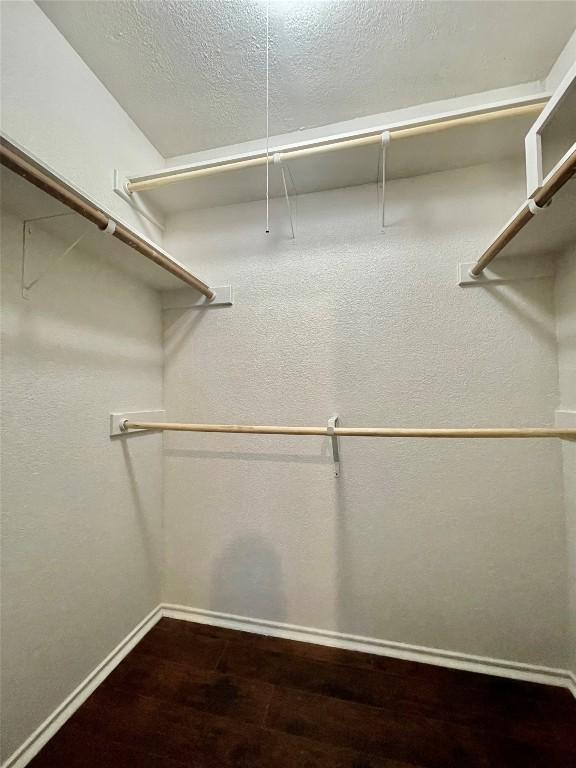 1933 Lisa Ln, San Marcos, TX 78666 - walk in closet with wood finished floors