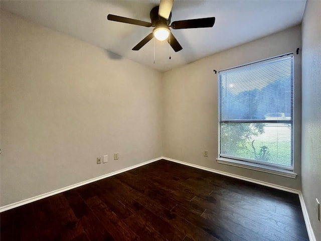 1933 Lisa Ln, San Marcos, TX 78666 - spare room with wood finished floors, baseboards, and ceiling fan
