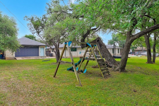 3701 Arrowhead Cir, Round Rock, TX 78681 - view of grassy yard with a playground and a detached garage