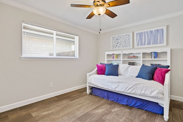 3701 Arrowhead Cir, Round Rock, TX 78681 - bedroom with wood finished floors, ornamental molding, and a ceiling fan
