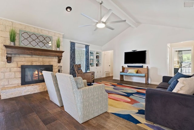 3701 Arrowhead Cir, Round Rock, TX 78681 - living area with ceiling fan, dark wood-style flooring, and a stone fireplace