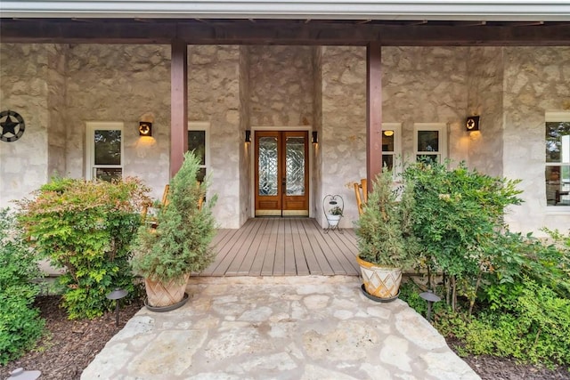 402 Lander Ln, Dripping Springs, TX 78620 - view of exterior entry with covered porch and french doors