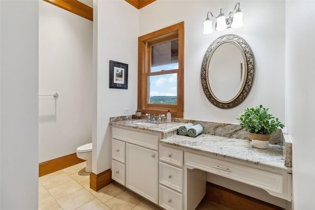 402 Lander Ln, Dripping Springs, TX 78620 - bathroom with vanity, toilet, tile patterned floors, and baseboards