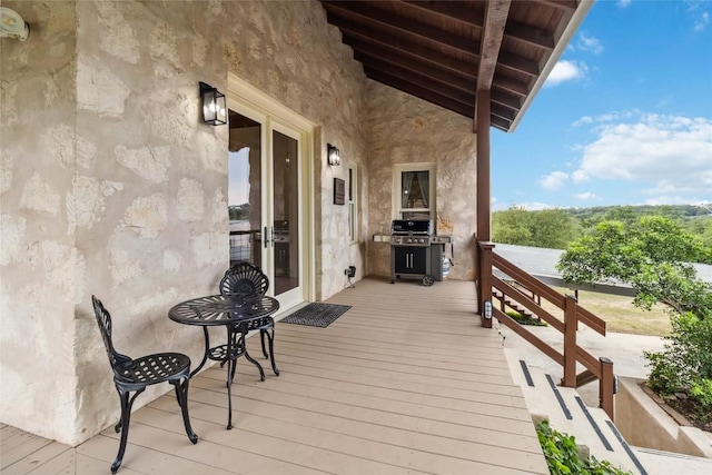 402 Lander Ln, Dripping Springs, TX 78620 - wooden deck featuring french doors and area for grilling