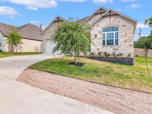 8505 Moccasin Path, Austin, TX 78736 - view of front of property with stone siding, driveway, and a garage