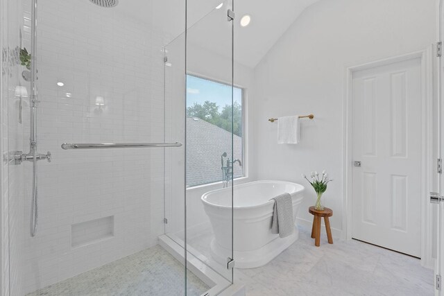 5209 Concho Creek Bnd, Austin, TX 78735 - bathroom featuring a stall shower, lofted ceiling, and a freestanding bath