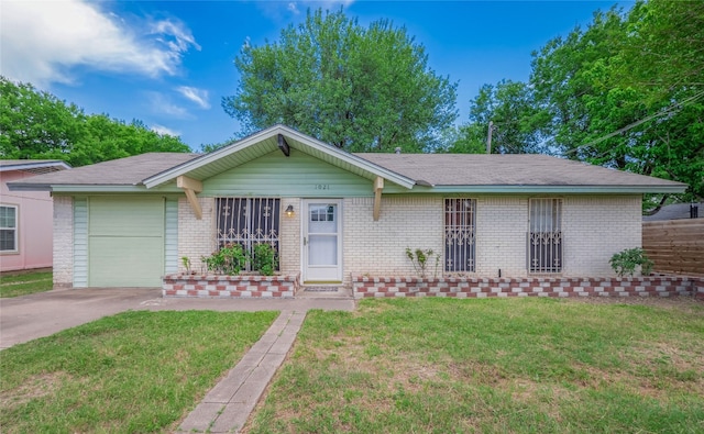 1021 Gardner Rd, Austin, TX 78721 - view of front of house featuring brick siding and driveway