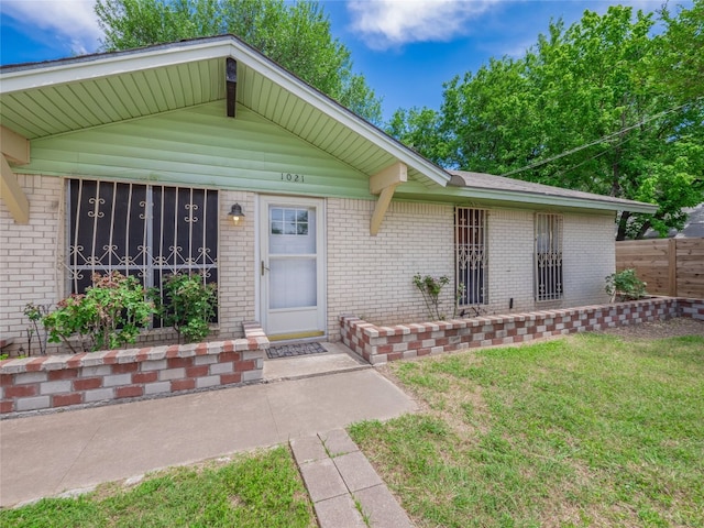 1021 Gardner Rd, Austin, TX 78721 - view of front of property featuring brick siding