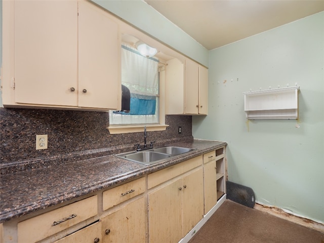 1021 Gardner Rd, Austin, TX 78721 - kitchen with a sink, backsplash, and dark countertops