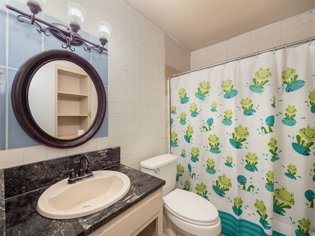 1021 Gardner Rd, Austin, TX 78721 - full bathroom featuring tile walls, vanity, toilet, tasteful backsplash, and a shower with shower curtain