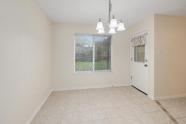 2202 Clayton Way, Cedar Park, TX 78613 - unfurnished dining area featuring a chandelier and baseboards